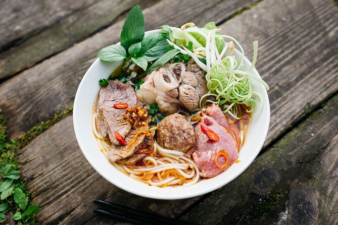 12 Tasting Street Food & Sightseeing By Scooter with Student - The Thich Quang Duc Monument and a difficult chapter