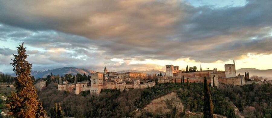 Alhambra and Nasrid Palaces and Local Food Experience - Charles V Palace, a sharp change in style