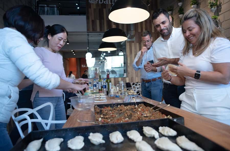 Argentinian Empanadas Cooking Experience in Palermo, Bs As - Folding empanadas and learning the little tricks