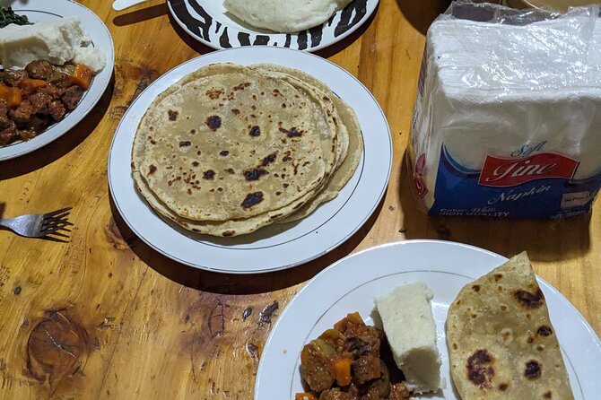Arusha: Traditional Tanzania Cooking class& Food Market Tour - Cooking plantain, chapati, ugali, and vegetables