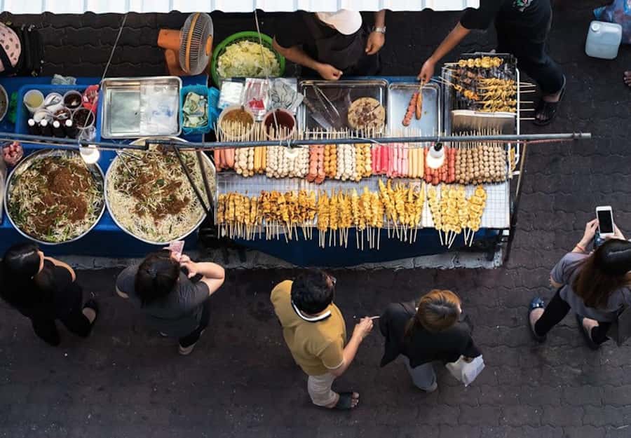 Bangkok: Chinatown Street Food Tour with 8+ Local Dishes - Grilled pork, sticky rice, and a local drink