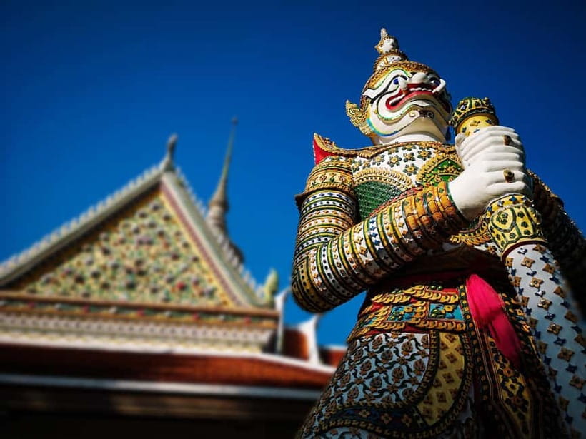 Bangkok: Grand Palace, Wat Pho, Wat Arun Sacred & Local Tour - Wat Arun across the Chao Phraya