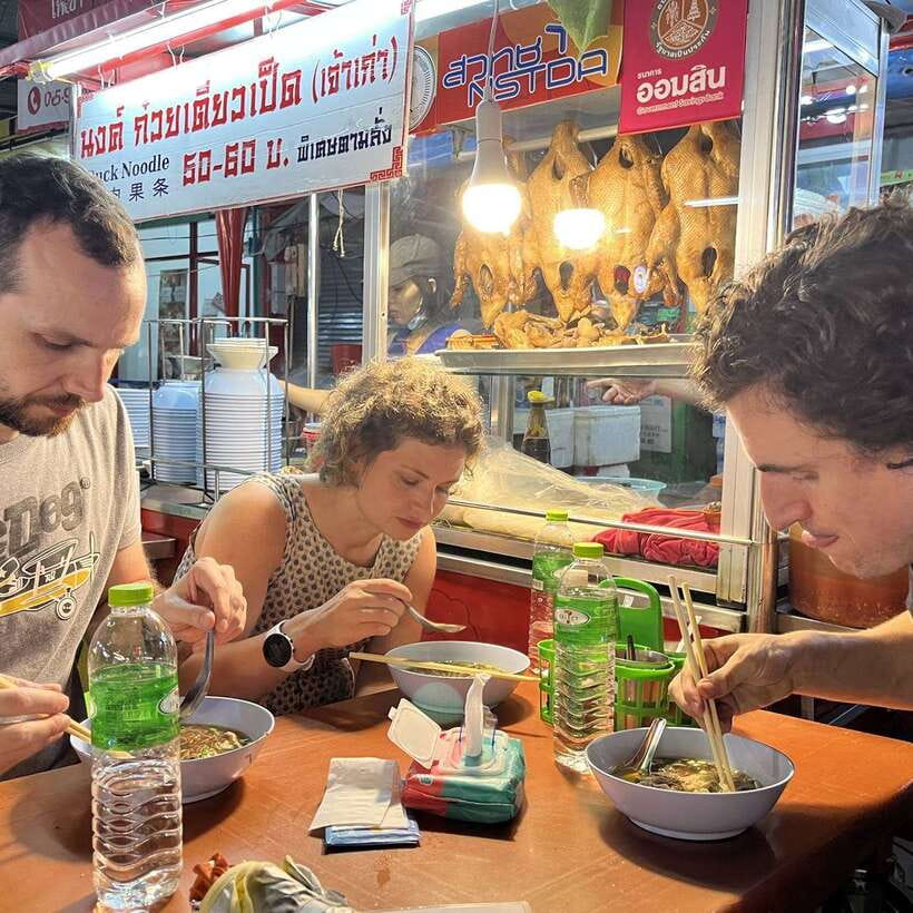 Bangkok: Street Food Tasting Tour at Night - Walking through Yaowarat after dark