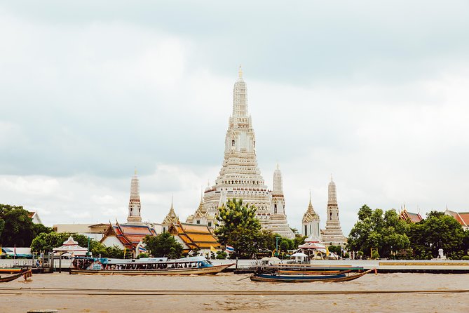 Bangkok: The Grand Palace, Wat Pho, and Wat Arun Walking Tour - Wat Arun, the final stop across the river