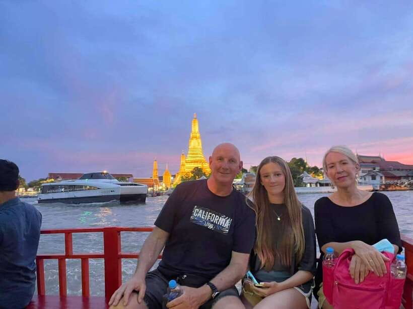 Bangkok Tuk-Tuk by Night with Chinatown Street Food Meal - Wat Arun lit against the river