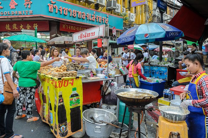 Bangkok Tuk Tuk Walk & Temple Tour With Wat Pho, Arun & Traimit - Walking through Chinatown and Yaowarat Road