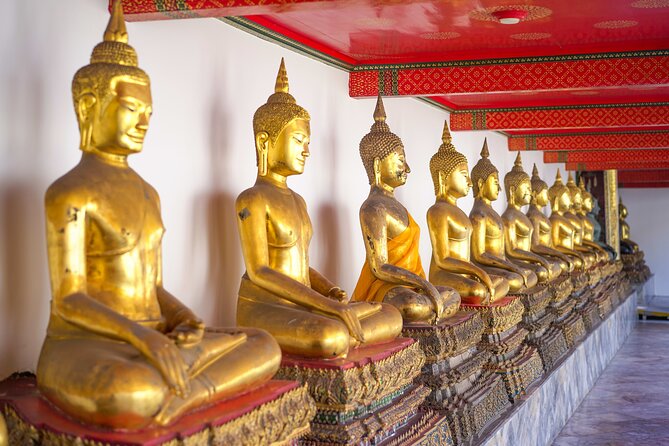 Bangkok Wat Pho and Flower Market Historical Walking Tour - Wat Arun in Thai dress