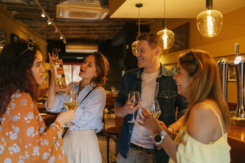 Barcelona: Food Walking Tour with Tapas and Wine - Nine tapas, from bravas to dessert