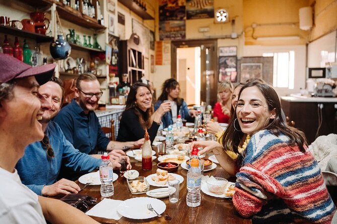 Barcelona Gracia Neighborhood Local Food & History Tour - A family pastry shop and the first taste