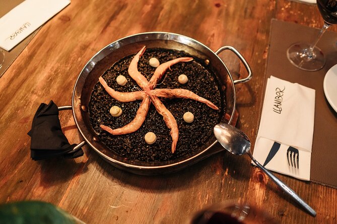 Barcelona: Guided Food Walking Tour with Tapas and Wine - Roman walls on the walk to El Born