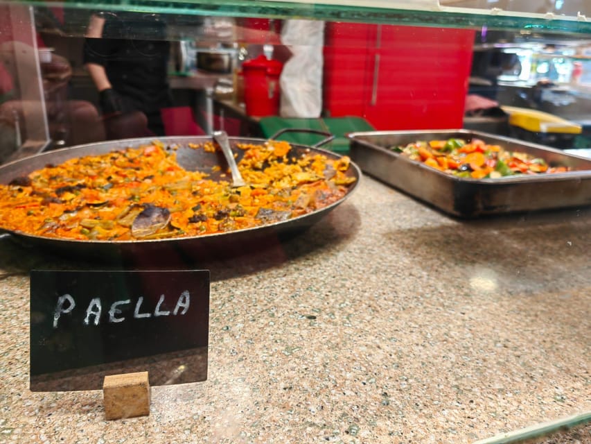 Barcelona: Local Market & Street Food Walking Tour - Family-run food stops beyond the market
