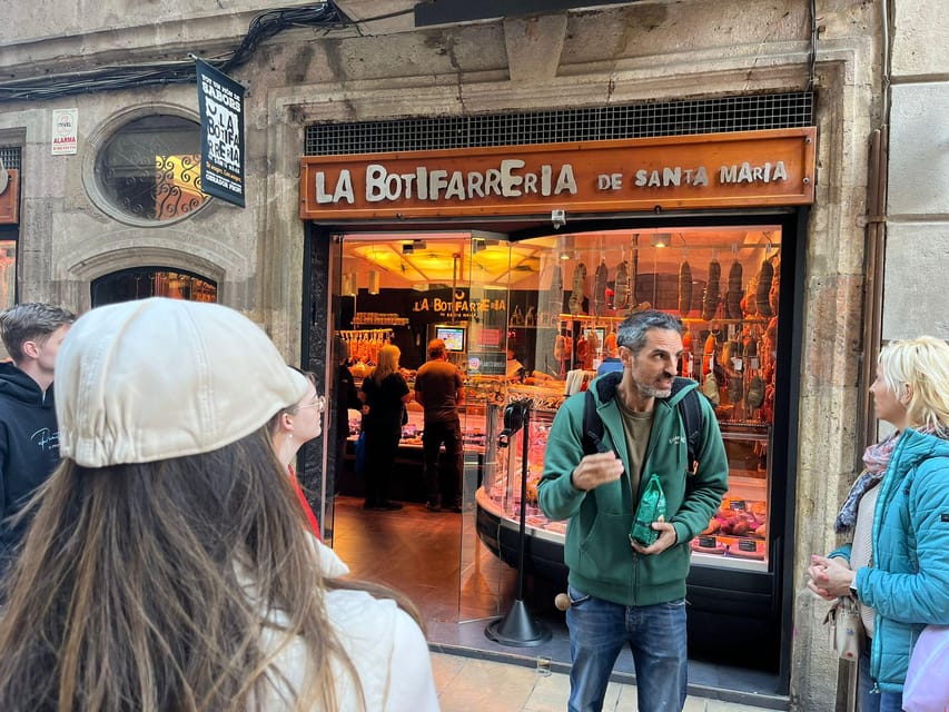 Barcelona: Street Food & Sightseeing Tour with Local Market - Starting beneath the Miró mosaic at Liceu