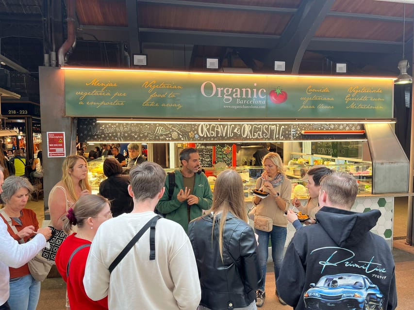 Barcelona: Street Food & Sightseeing Tour with Local Market - Ham, olives, and the Spanish food lesson