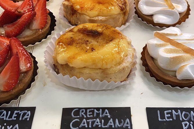 Barcelona Street Food Tour with Local Market & City Center Visit - Las Ramblas: seeing Barcelona’s famous people-watching strip
