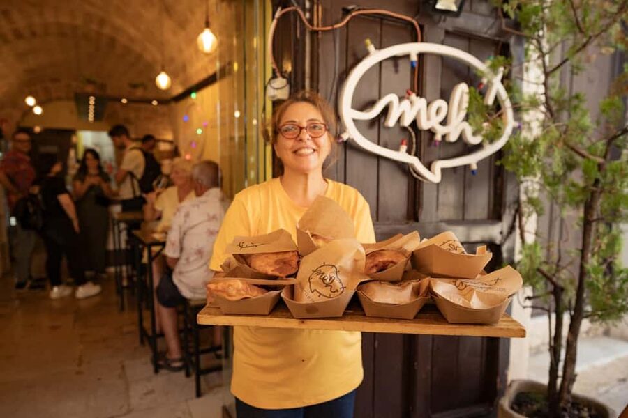 Bari Street Food Tour by Bike - Octopus bread at a traditional rotisserie