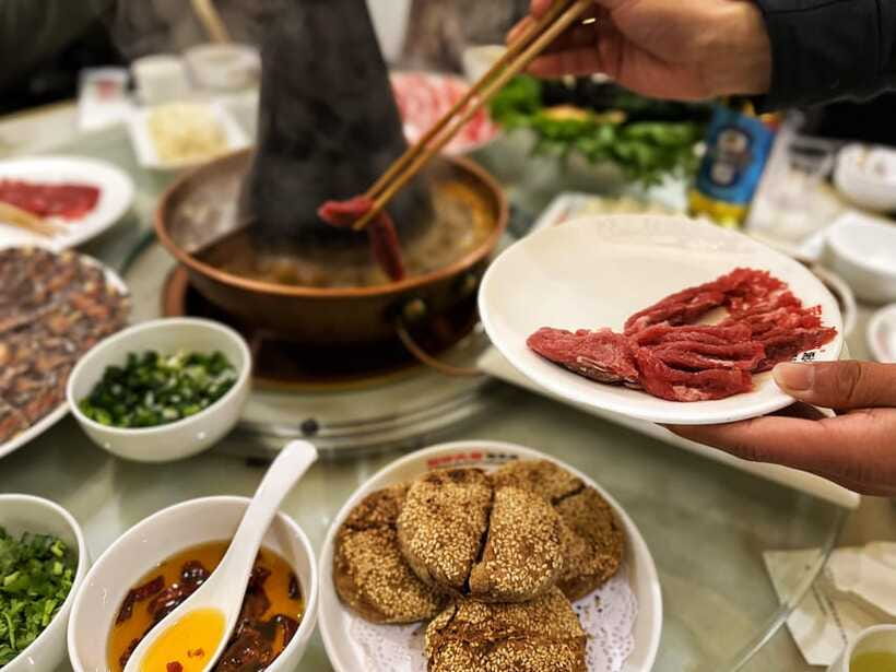 Beijing Hutong Food Crawl Delights: Peking duck, Hotpot&More - Mongolian hot pot around a copper charcoal stove