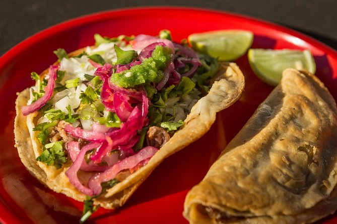 Bikes and Bites: Taco Bicycle Tour in Puerto Vallarta - Guadalupe Parish explains Puerto Vallarta’s symbol