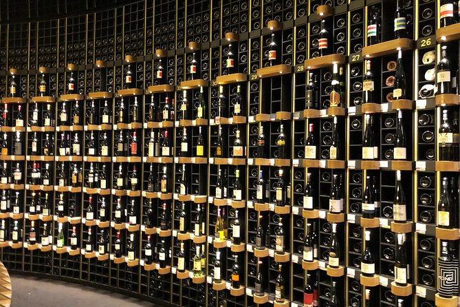 Bordeaux Old Town & Market Local Food with Wine Tastings Tour - Bordeaux wine in a small-shop setting