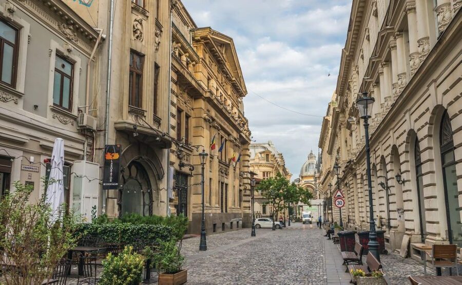 Bucharest Panoramic City Tour & Street Food - Parliament Palace and the scale of communist Bucharest