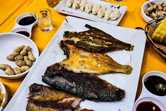 Busan: Food Crawl with Fish Market, Soju Tents & Local Snacks - Crossing Yeongdodaegyo Bridge for soju tents