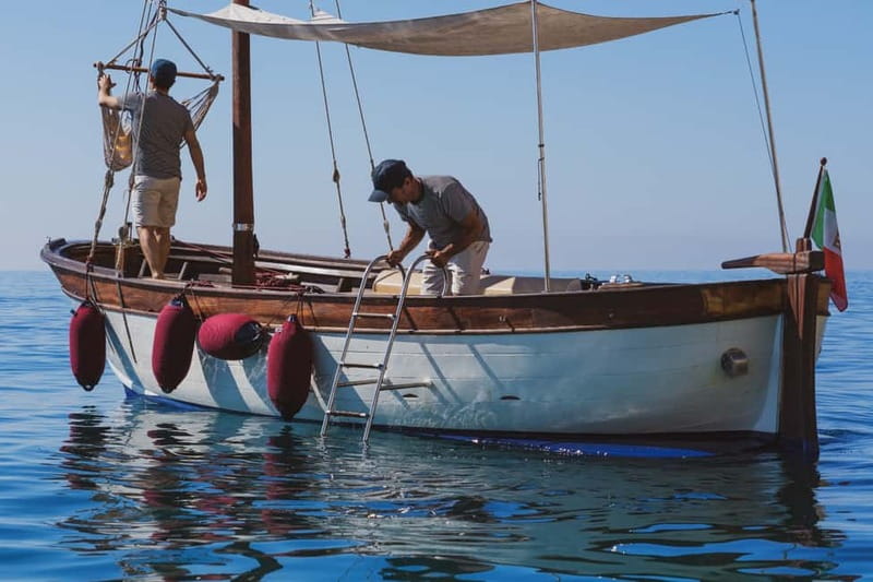 Cagliari: Gozzo Tour with 3 Swim Stops, Snorkel & Local Food - Cala Bernat gives you an easy start