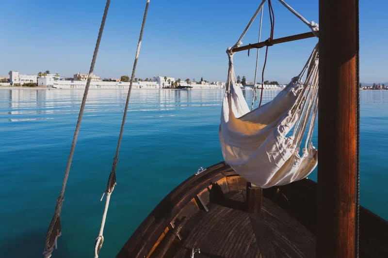 Cagliari: Gozzo Tour with 3 Swim Stops, Snorkel & Local Food - Poetto brings the coast into focus