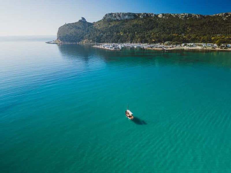 Cagliari: Gozzo Tour with 3 Swim Stops, Snorkel & Local Food - Meeting the gozzo at Molo Dogana