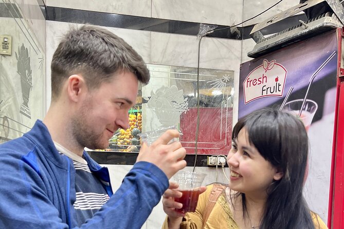 Cairo Street Food with a Local Family - The second neighborhood: tuk-tuks and local markets