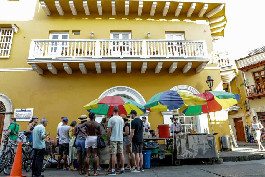Cartagena: Street Food Walking Tour - Empanadas, cheese bread, fruit, ceviche, and sausages