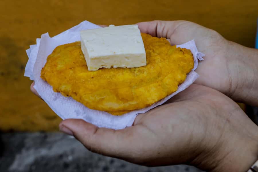 Cartagena: Street Food Walking Tour - The first stop: Chinese flavors in a Cartagena kitchen