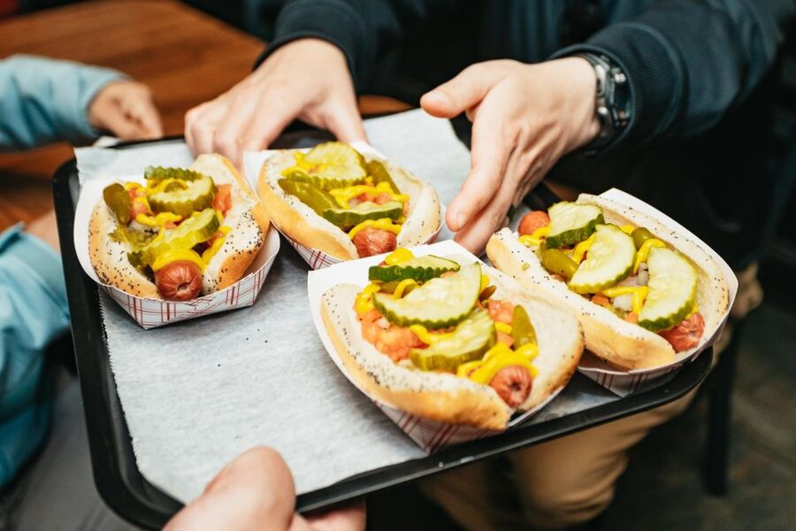 Chicago: Classic Food Walking Tour with Bike or Kayak Rental - Deep-dish pizza and the Chicago hot dog