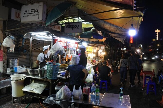 Chinatown Street Food Night Tour by Tuk Tuk in Bangkok - Wat Ratchanatdaram and the Grand Palace view