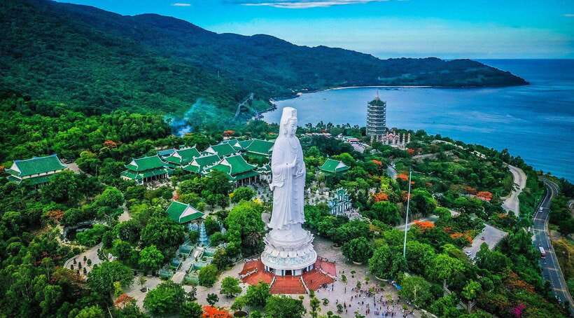 Da Nang City Sightseeing & Street Food Full Day Private Tour - Dragon Bridge and Tran Thi Ly Bridge show modern Da Nang