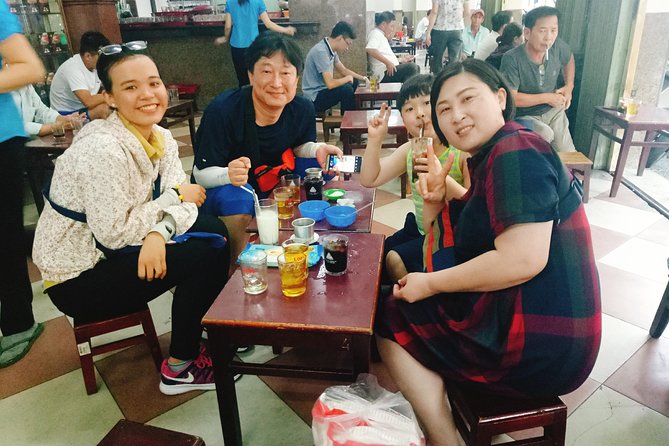 Da Nang: Seafood dinner, night market, sightseeing by night - Riding through the city with a local guide