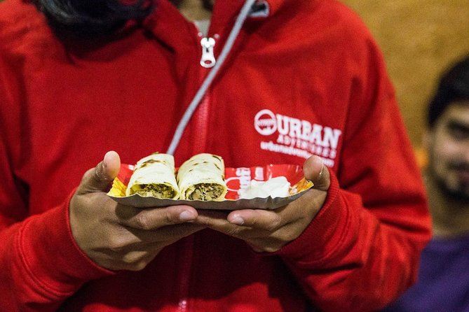 Delhi Food Walk: Rickshaw Ride, Street Eats & Market Tour - Golgappa, yogurt, and the appeal of a little food risk