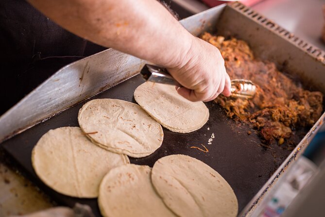 Delicious Street Food Tour from your hotel in Cancun! - Stop three: slow-cooked birria with melted cheese