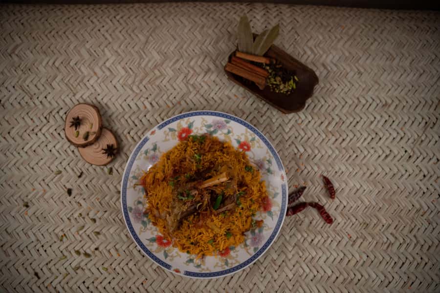 Dubai Food Tour: 4 Cuisines, Souks & Street Bites - Emirati food at Al Khayma Heritage Restaurant