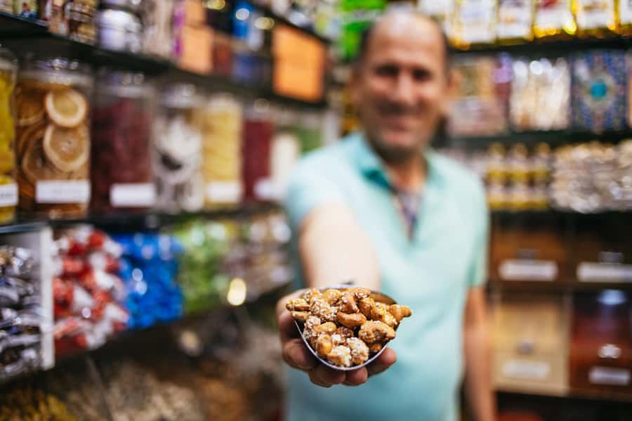 Dubai: Half-Day Street Food Tour - Sitting down for Lebanese food with local diners