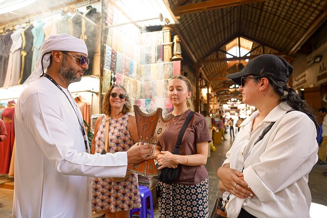Dubai: Old Town, Souks, Street Food, Guided Tour & Abra Ride - Timing, walking, and pickup advice