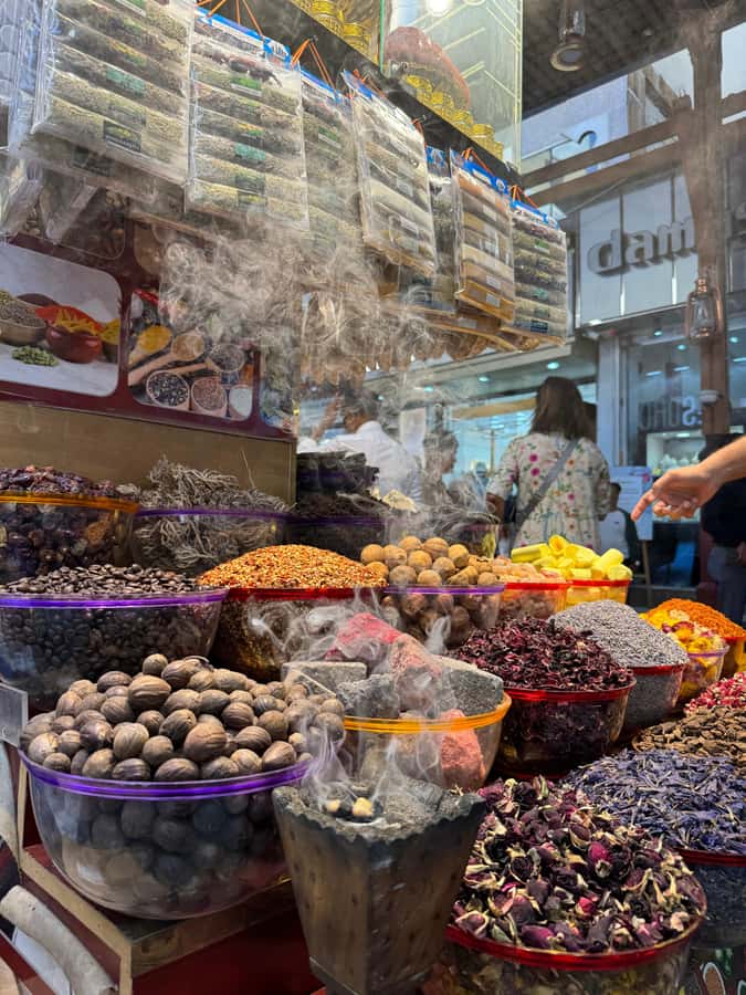 Dubai: Old Town Walking Tour with Abra Cruise & Street Food - Textile Souk: color, fabric, and bargaining