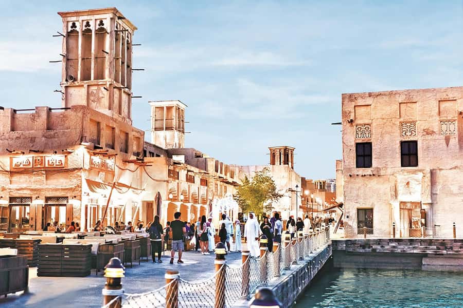 Dubai: Old Town Walking Tour with Abra Cruise & Street Food - Crossing Dubai Creek by abra