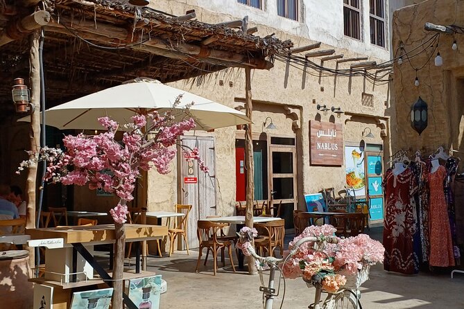 Dubai Souks, Museum, Street Food Walking Tour with Hotel Transfer - Walking through Al Bastakiya and Al Fahidi