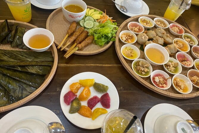 E biking Night Street Food Tour with Local Guide - Starting with beo, nam, loc, and nem lui
