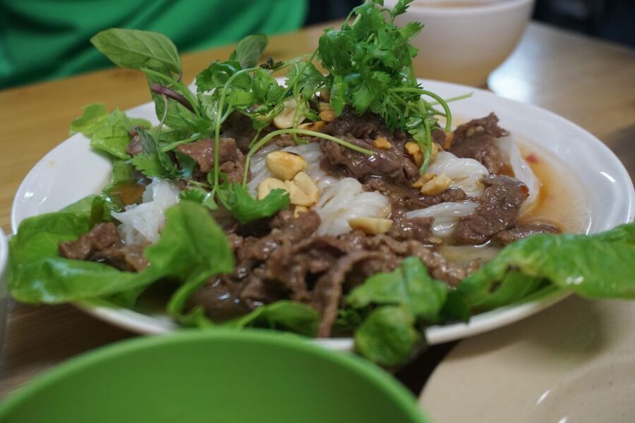 Enjoy Hanoi Like a Local - Vespa & Street Food Tour by Night - Truc Bach Lake, West Lake, and the evening ride