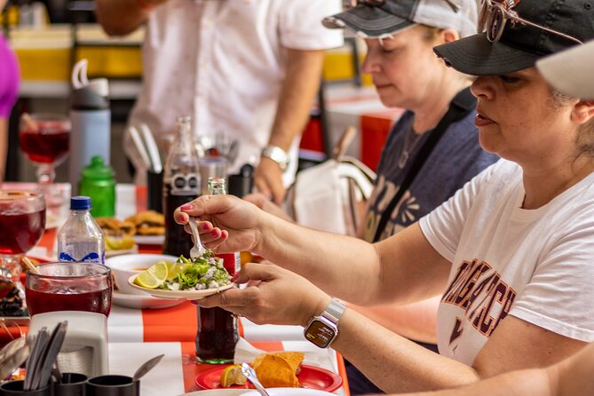 Food Walking Tour with Julio - Eat as a Local - Traditional drinks, with one point to clarify