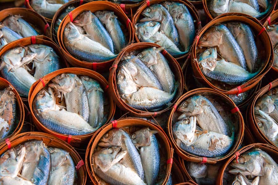 From Bangkok: Maeklong Railway and Floating Market Food Tour - The guides are a major part of the value