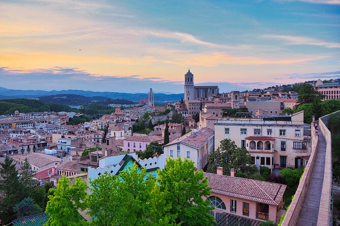 Girona History, Legends, and Food Walking Tour with food tasting - Crossing Pont de Pedra for the river views