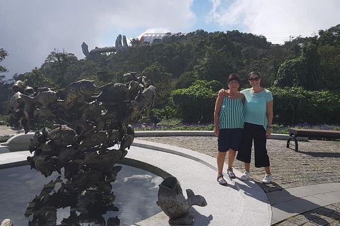 Golden Bridge & Hoi An City Tour with RiverBoat Ride-Night Market - A short sampan ride on the Thu Bon River
