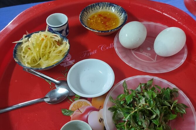 Half-day Private Street Food Tour in Hoi An - The optional balut challenge near BIDV ATM