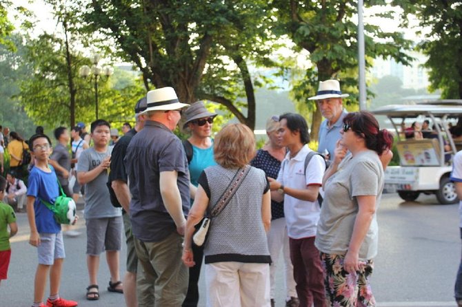 Hanoi City Street Food Night Tour by Motorscooter - Hoan Kiem Walking Street and the city after dark